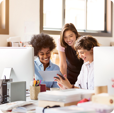 Women working and smiling together
