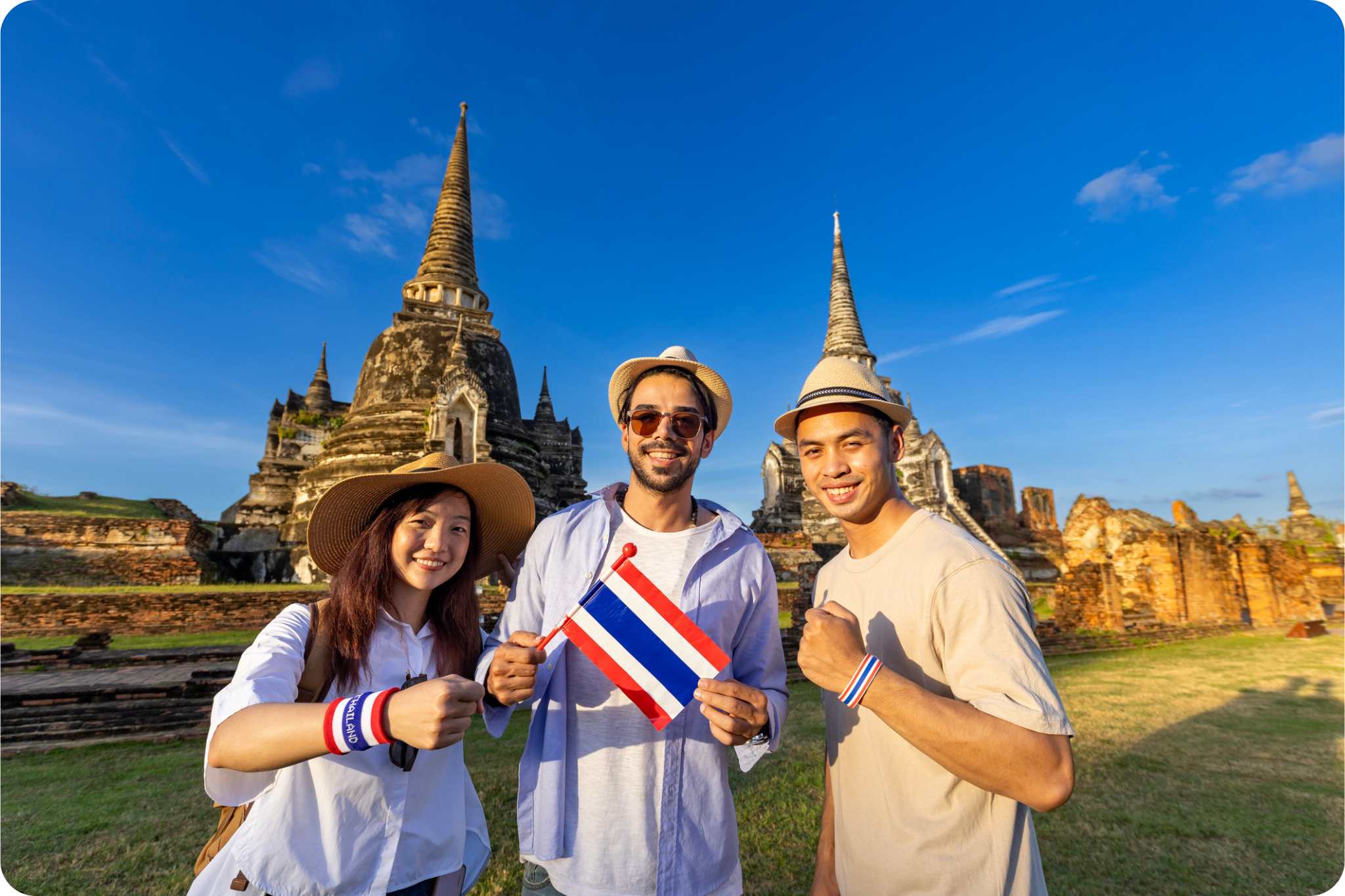 Group celebrating Thai culture outdoors