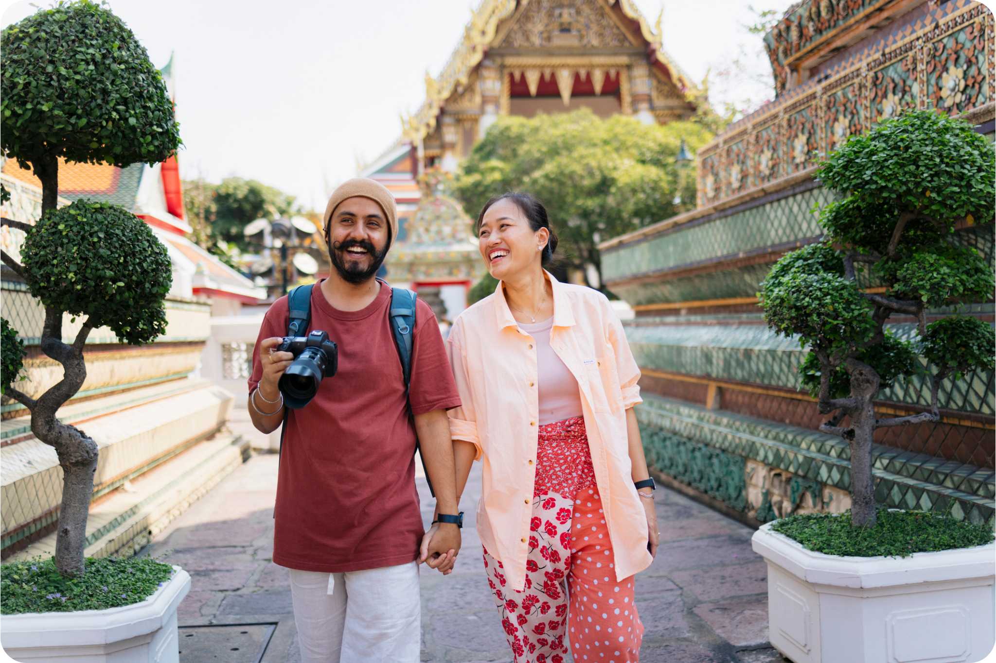 Couple exploring Thai temple