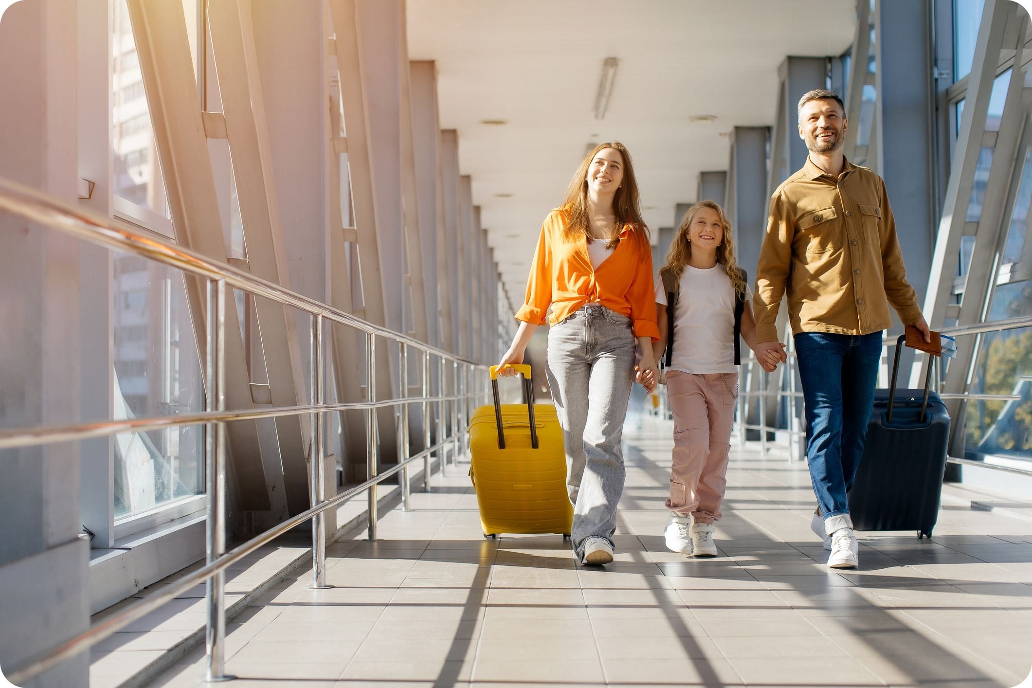 Family walking together at the airport