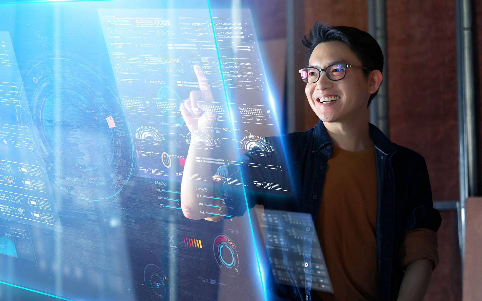 A man using a touchscreen interface in a data center, with AI-generated data visuals displayed in front of him