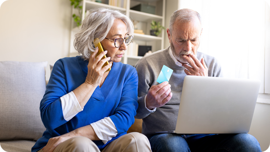 Senior couple having problems with secure online payment