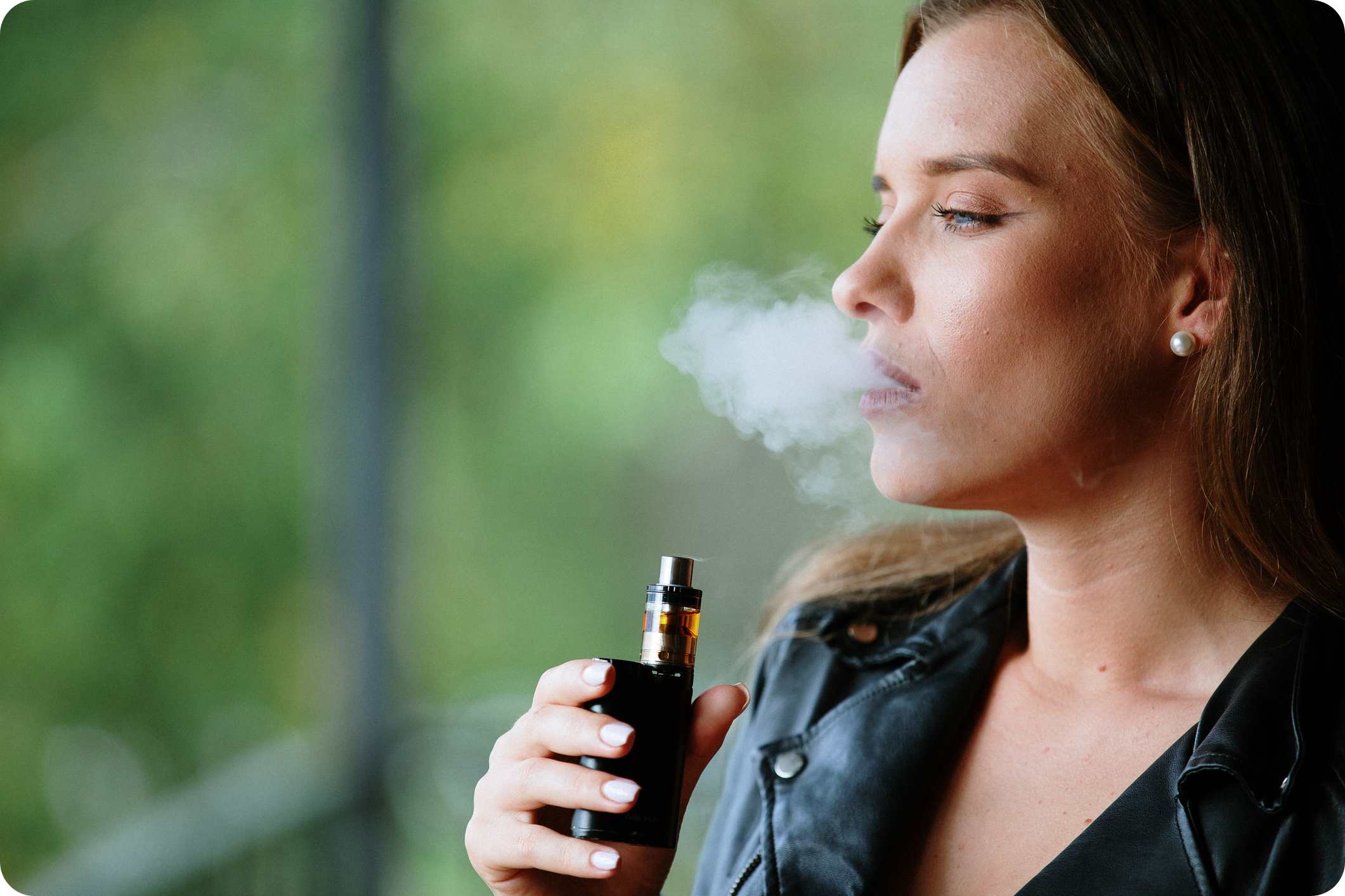 Woman smoking an electronic cigarette