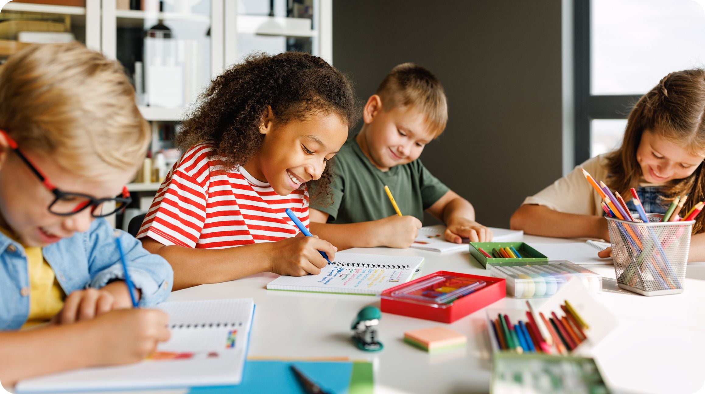 Girl solving test with classmates smiling