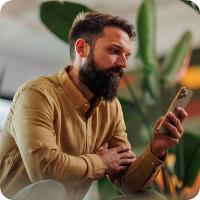 Businessman using smartphone in the office