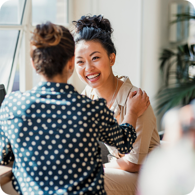 Two Friends Talking at Work 
