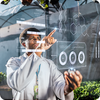 Young botanical man analyzing data in the greenhouse 