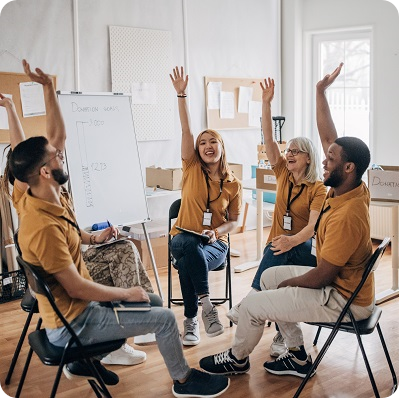 People smiling and celebrate during a meeting