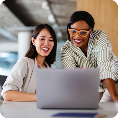 Two business women collaborating in the office