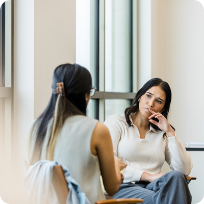 Serious discussion between two HR business women