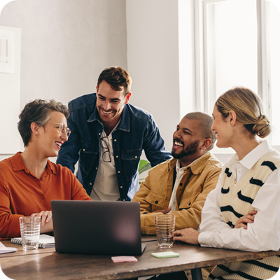 Cheerful designers having a meeting in an office