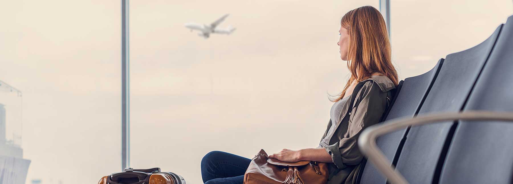 Woman seating at an airport 