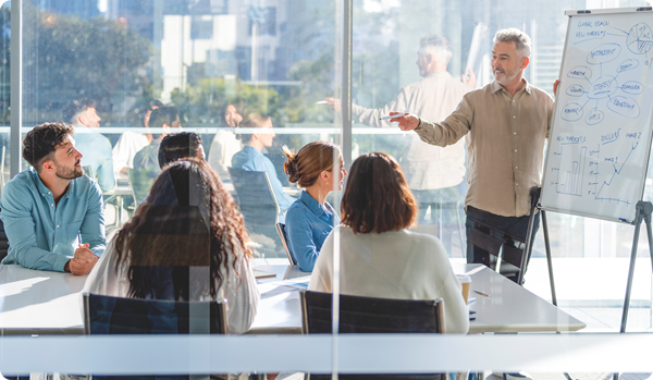 Business people watching a presentation on the whiteboard
