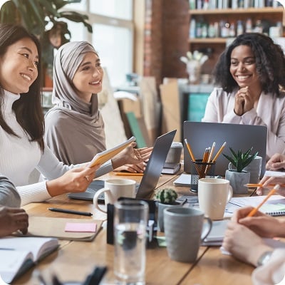 Work collegue smiling each other