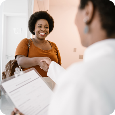 Arriving at the doctor's office shake hands 