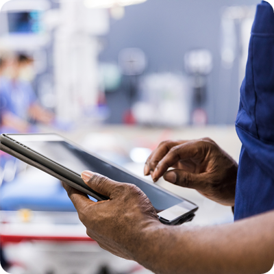 Unrecognizeable person using digital tablet