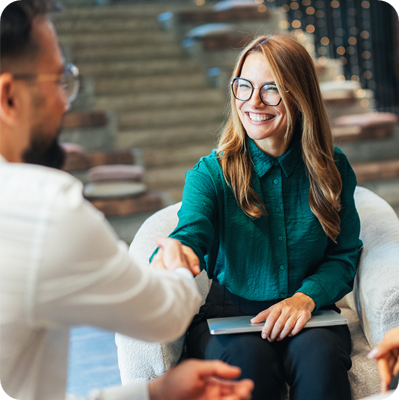Business people shaking hands in the office. 