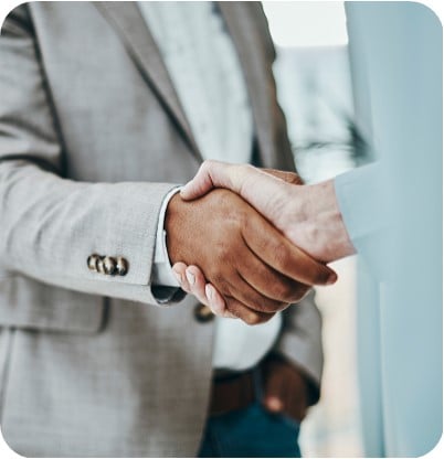 Two business people shaking hands