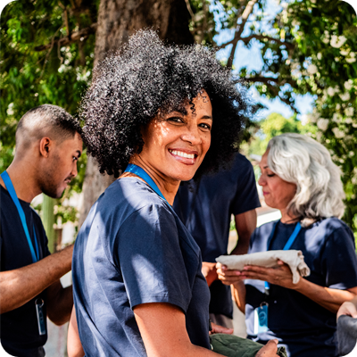 Portrait of mature volunteer woman outdoors