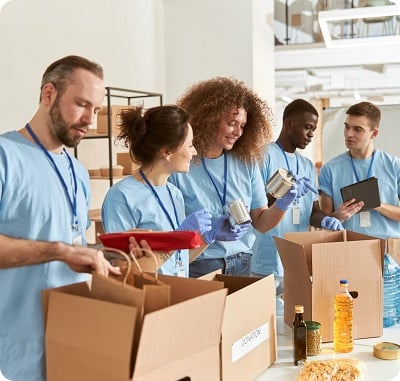 people preparing aid boxes