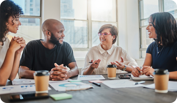 Shot of a group of young businesspeople having a meeting in a modern office