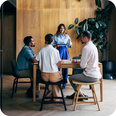 Team Discussing Ideas in a Collaborative Workspace With Modern Design