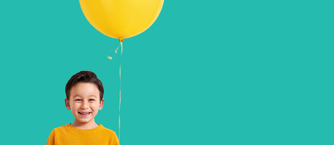 happy kid with balloon