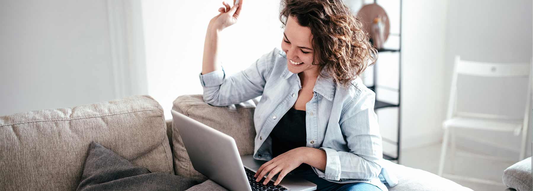 Women checking her laptop.