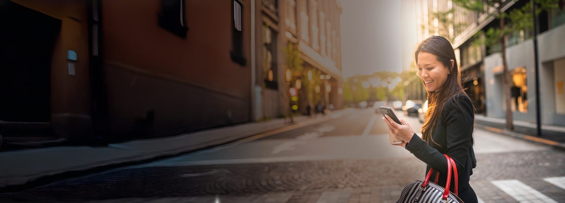 Business man shaking hands with a business women in the street.